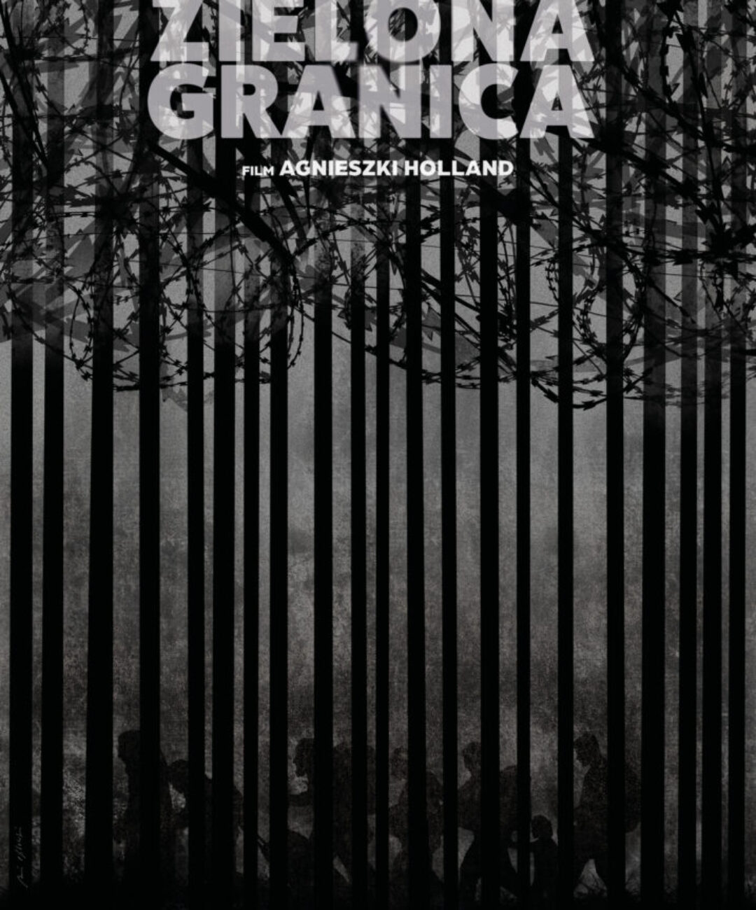 Andrzej Pągowski z plakatem do filmu “Zielona Granica”